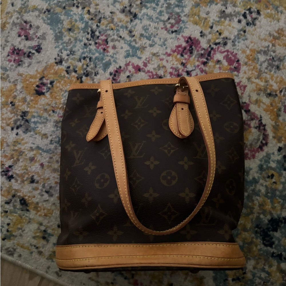 Louis Vuitton. All offers! Brown Monogram bucket purse! No marks never used!